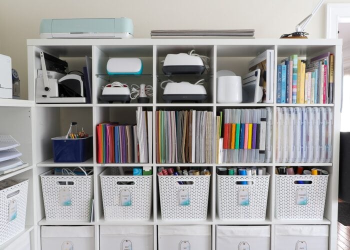 IKEA Kallax shelves loaded up with craft supplies in home office