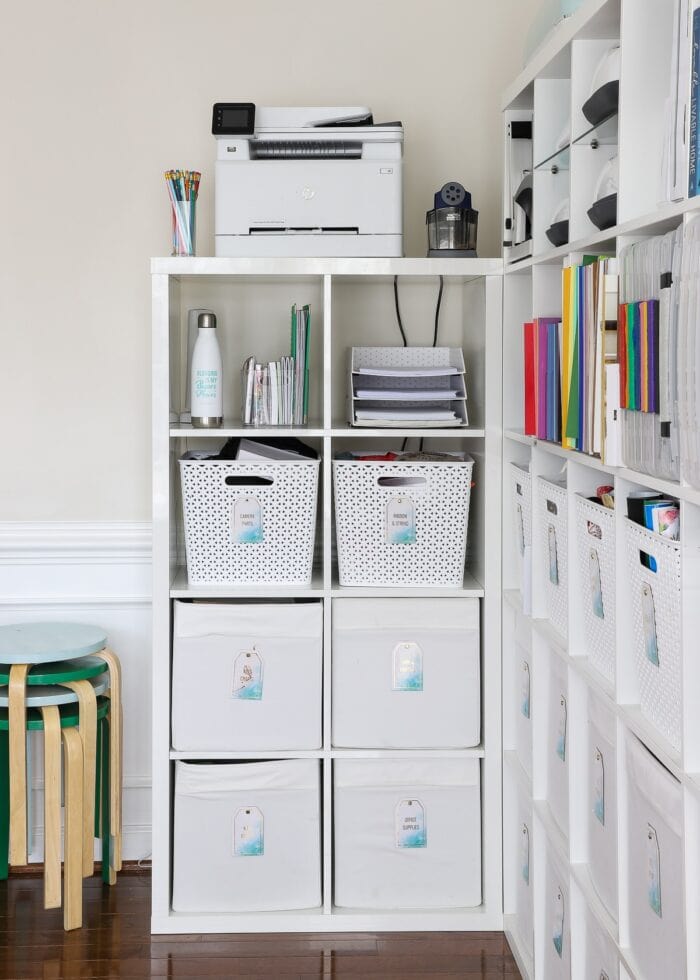 IKEA Kallax shelves loaded up with craft supplies in home office