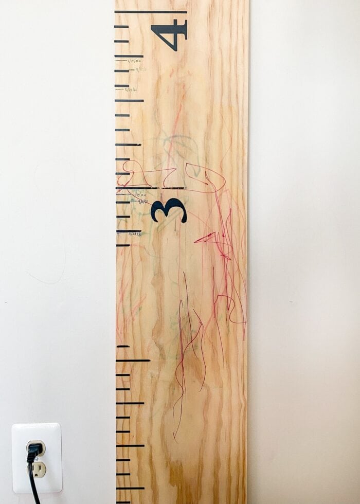 Wall ruler covered in marker