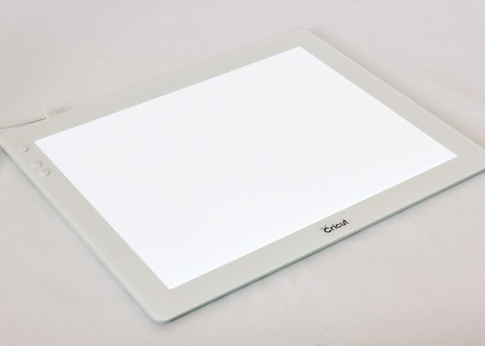Shot of Cricut Bright Pad on a white table
