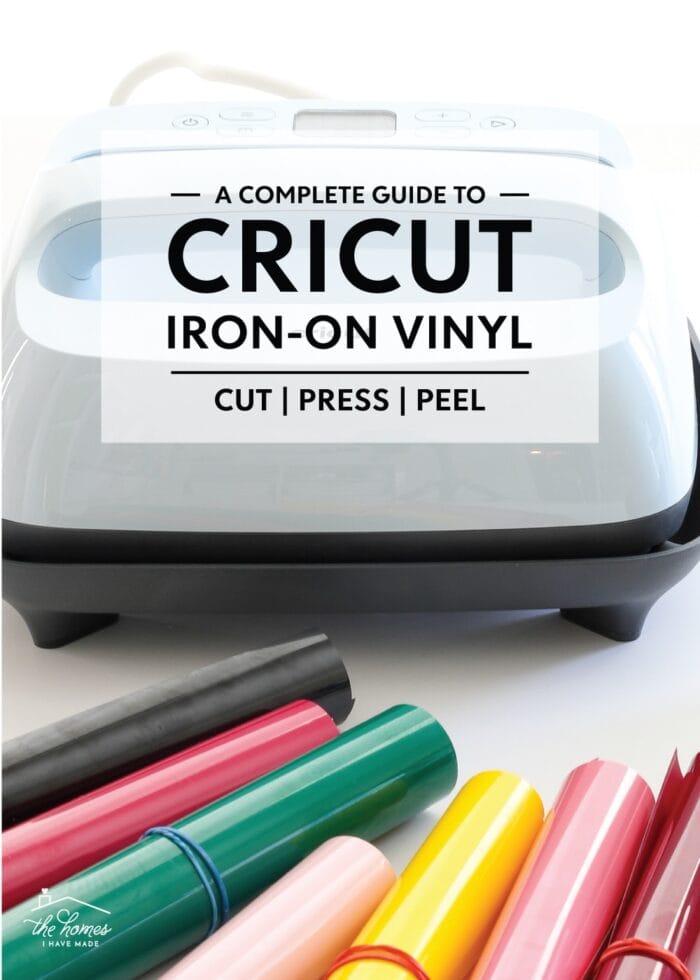 Cricut EasyPress 3 shown with rolls of iron-on vinyl