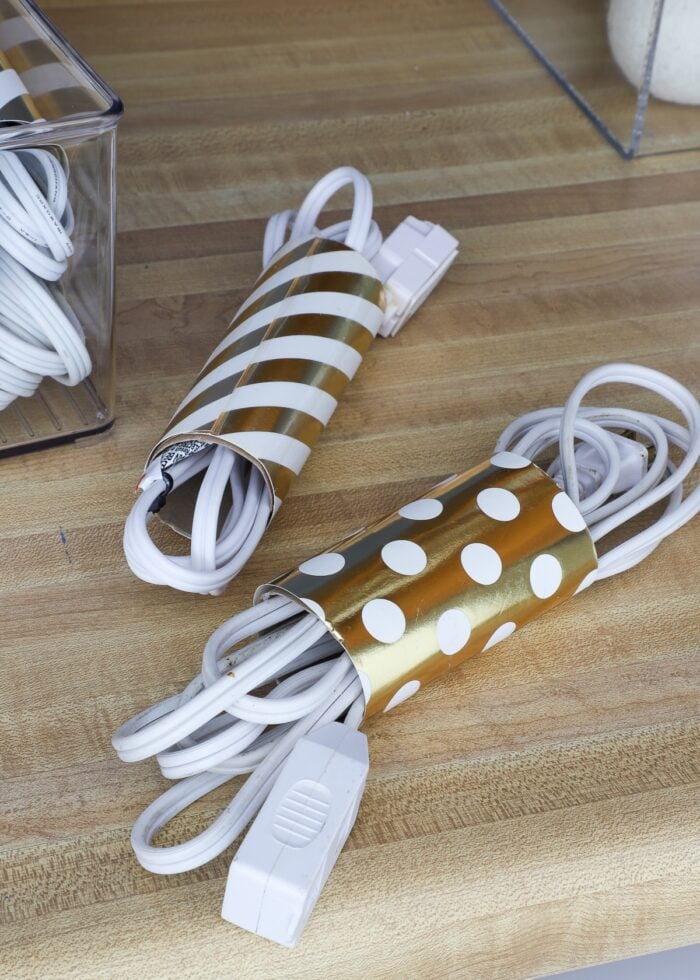 Cardboard rolls holding electrical cords