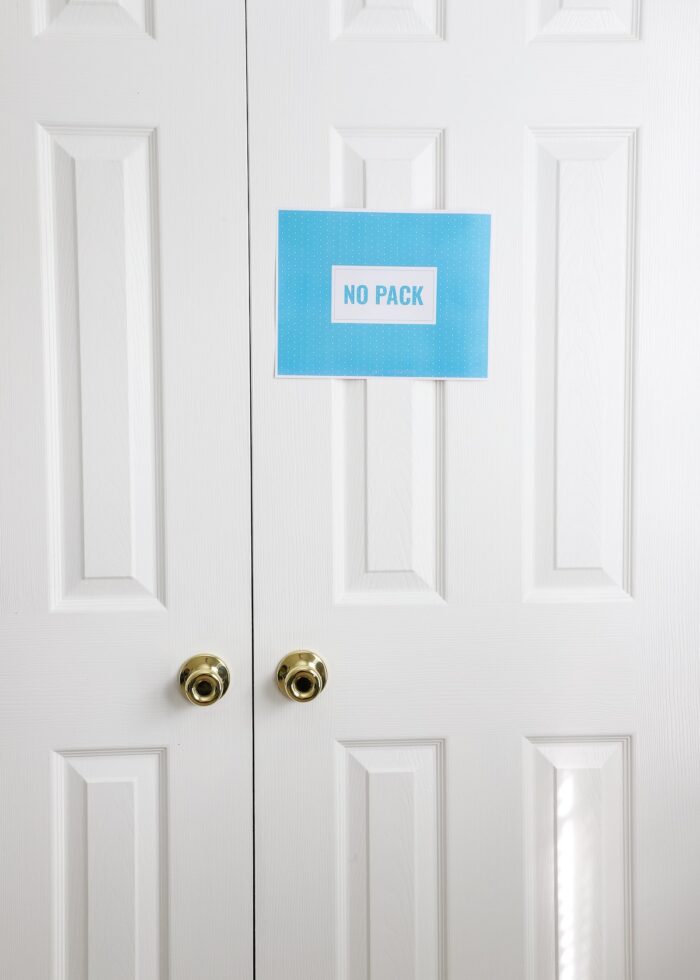"No Pack" sign on a closet door ready for professional packers