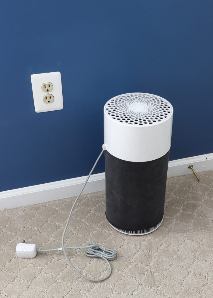 An unplugged air purifier ready for professional packers