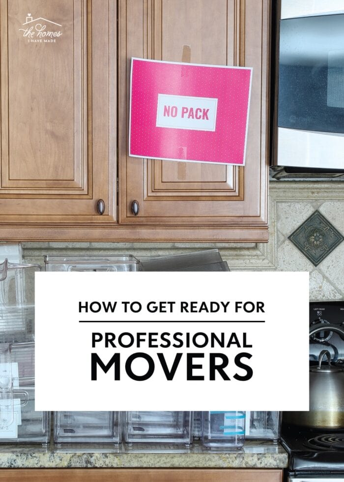 Pink "No Pack" sign on brown cabinets ready for professional packers