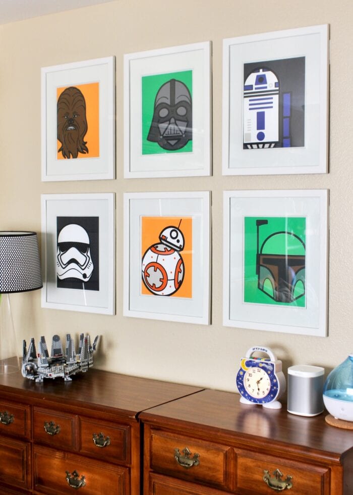 Star Wars artwork hung in a gallery wall