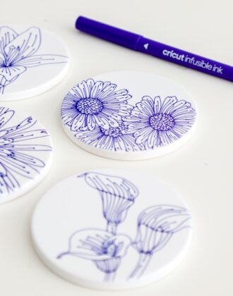 Flower coasters made with blue Cricut Infusible Ink Pens