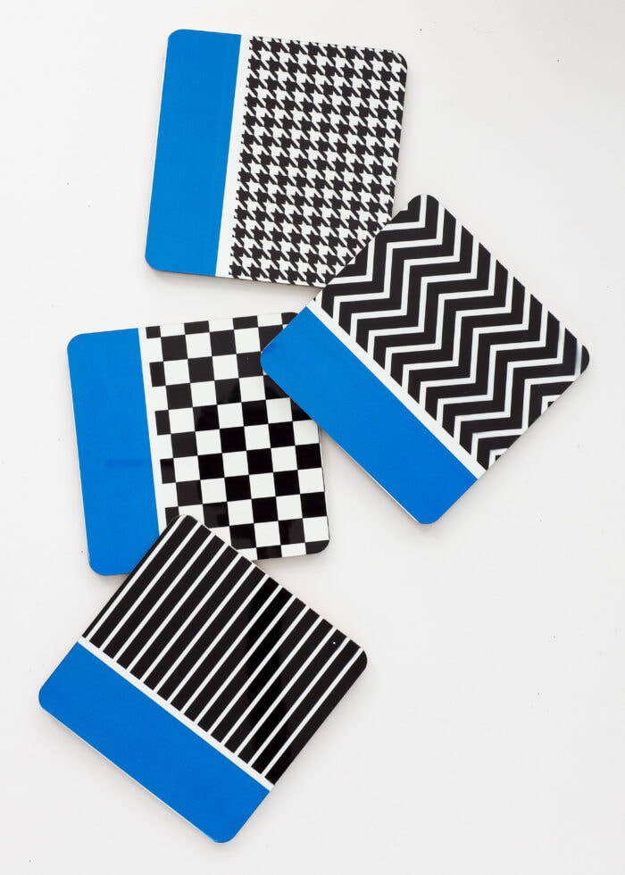 Blue, white, and black coasters made with Infusible Ink Transfer Sheets