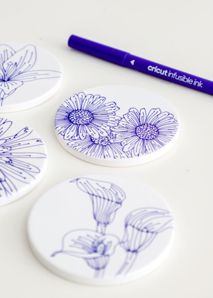 Coasters with flower designs drawn with Cricut Infusible Ink Pens