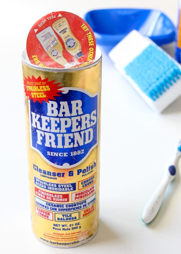 A bottle of Bar Keepers Friend on a white table