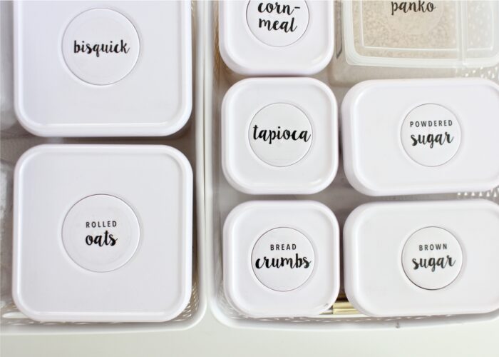 White Oxo kitchen canisters with printed Pantry Labels