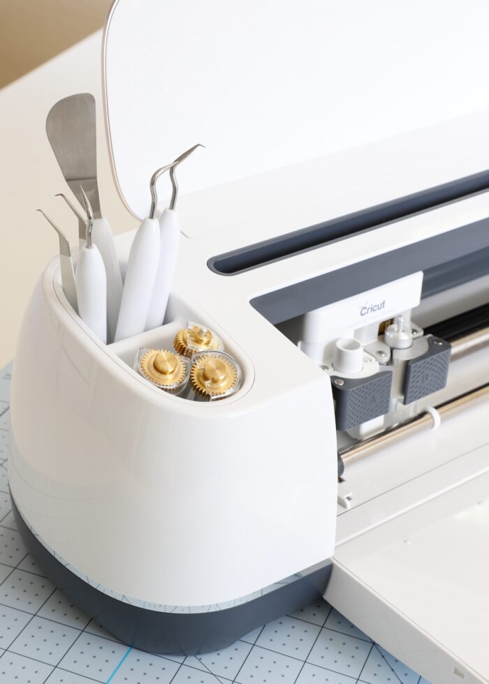 Cricut storage containers holding blades and tools