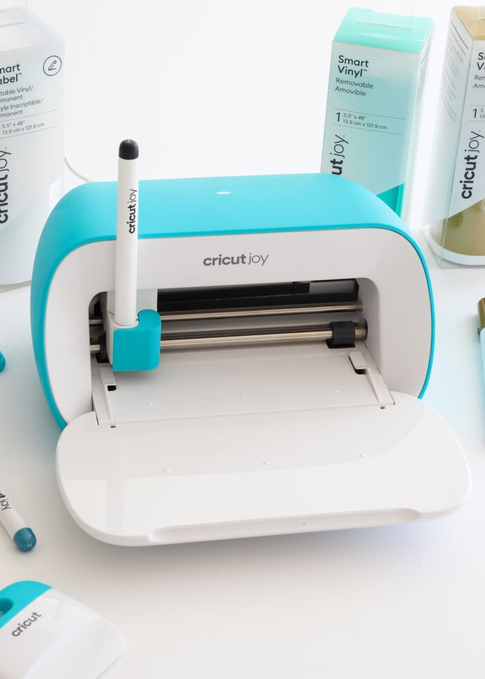 Cricut Joy machine with blank pen inserted into clamp