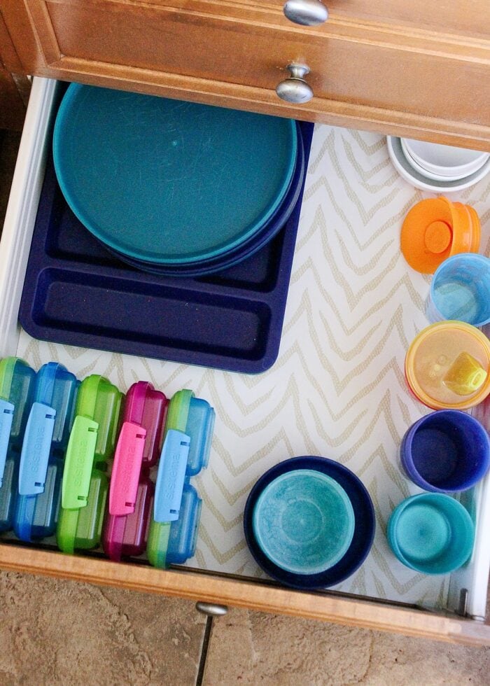 organizing kitchen drawers, consider kids plates, cups, and bowls