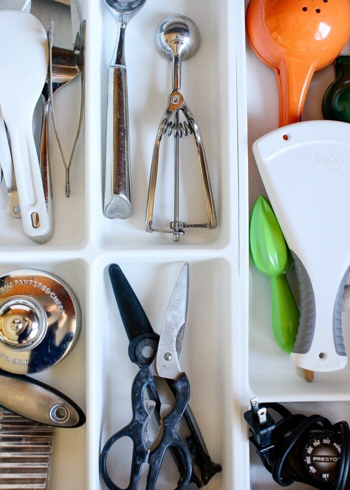 organizing kitchen drawers with white dividers