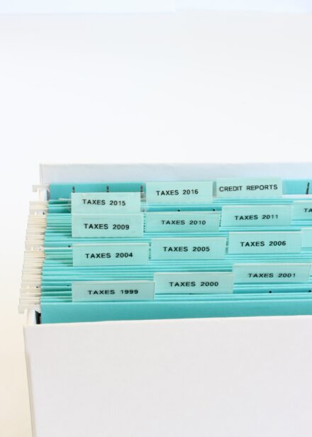 White file box with turquoise labeled dividers