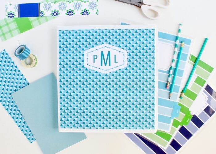 A white binder with a blue printable binder cover