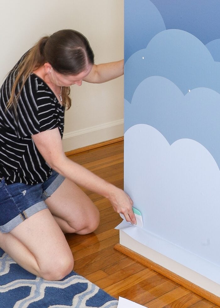 Megan creasing first wallpaper mural panel