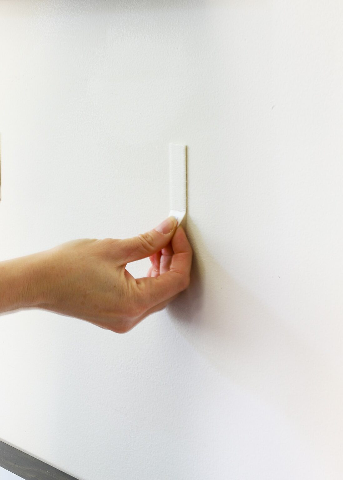 How to remove command strips without damaging your walls the homes