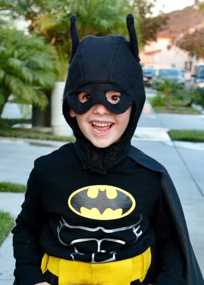 Little boy in a Lego Batman Costume