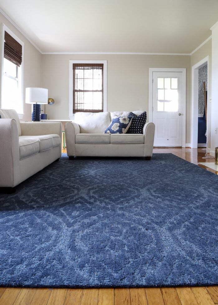 Blue Aidy Hand-Tufted Wool Rug (10x14') from Pottery Barn in beige family room