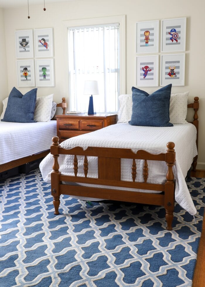 Blue Trellis Wool Rug (9x12') from Target under wooden twin beds