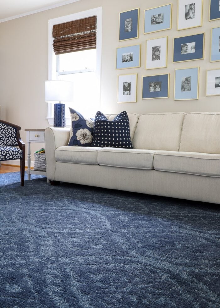 Blue Aidy Hand-Tufted Wool Rug (10x14') from Pottery Barn with white couches
