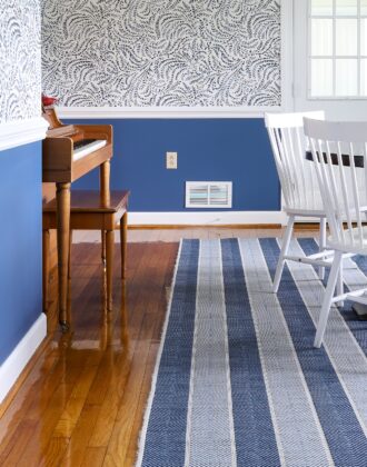 Beach Stripe Outdoor Rug (9x12') from Target with blue walls and wallpaper