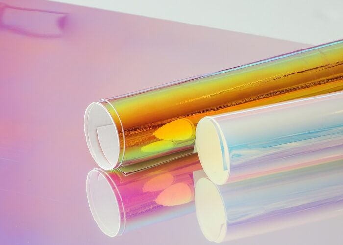 Rolls of Holographic Vinyl on a white table