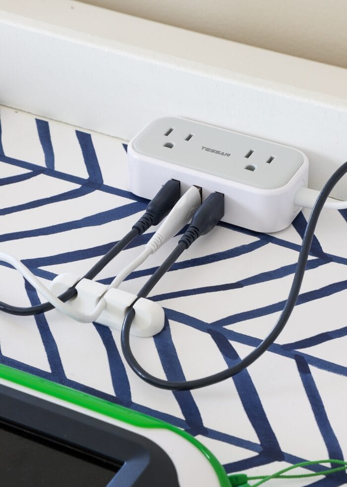 Charging cords plugged into USB port