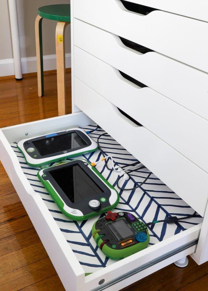 Set of IKEA Alex drawers with charging station setup in bottom drawer