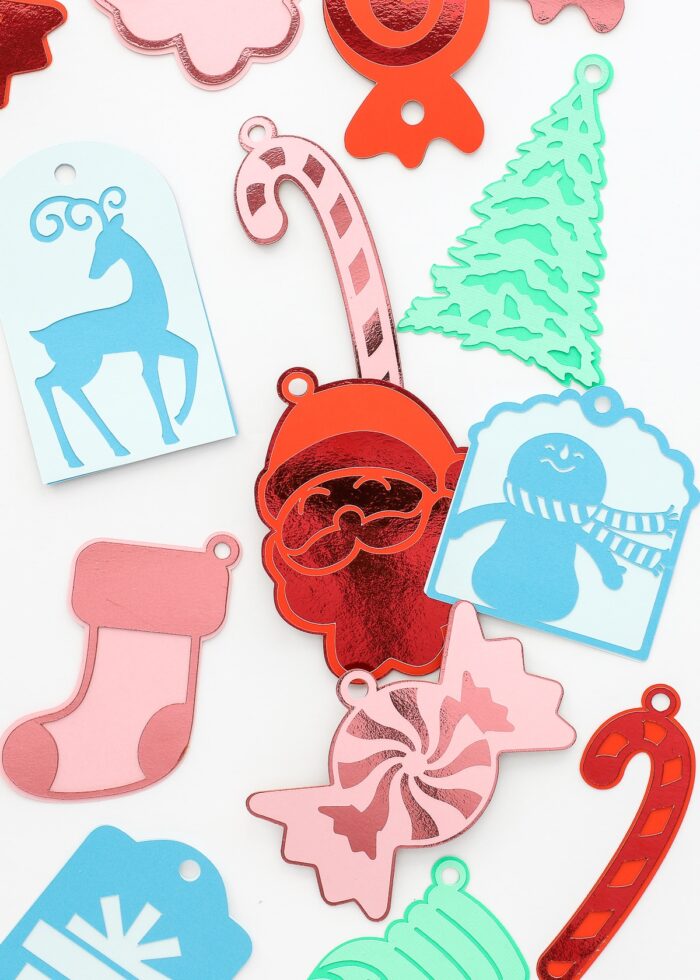 DIY Christmas Gift Tags made from blue, red, pink, and green papers
