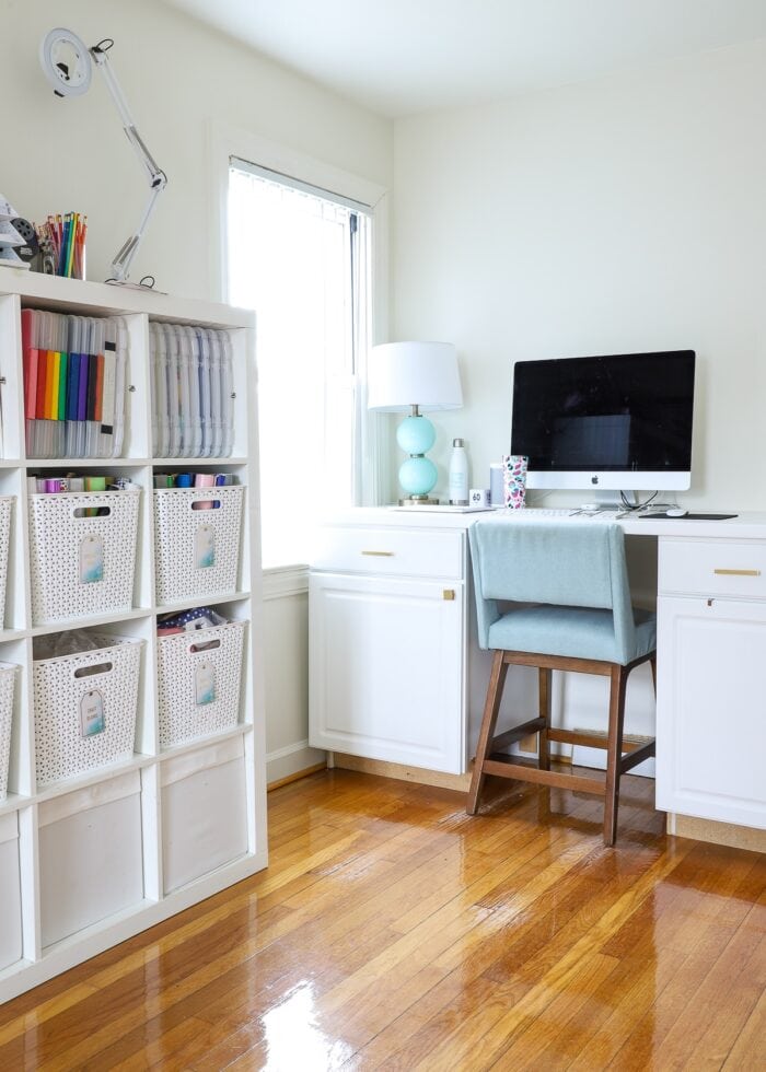 Office with white counters and white IKEA Kallax shelves