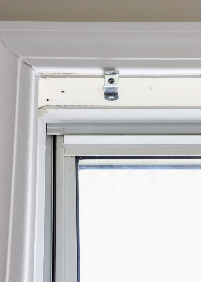 Close up shot of hardware for vertical blinds