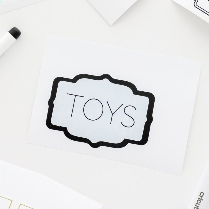 A "Toy" label with a black background
