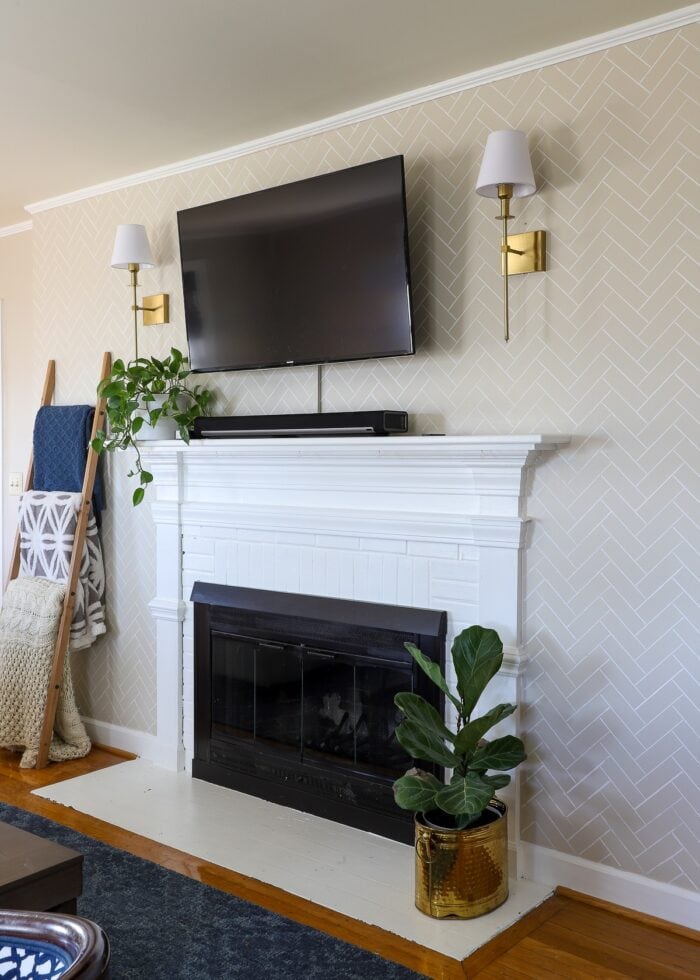 Fireplace wall with a herringbone pattern stenciled on the wall