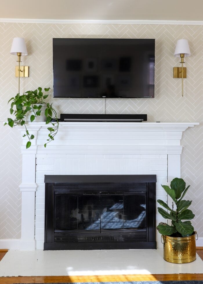 Fireplace wall with a herringbone pattern stenciled on the wall