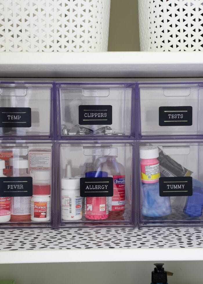 Clear acrylic drawers on a bathroom closet shelf