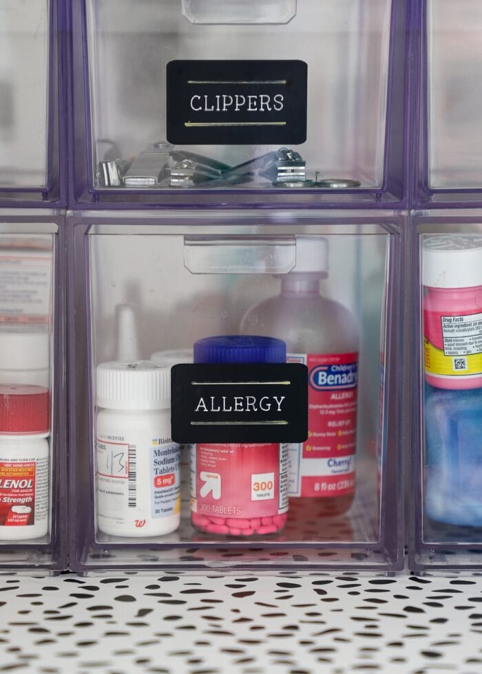 Clear acrylic drawers holding allergy medicines