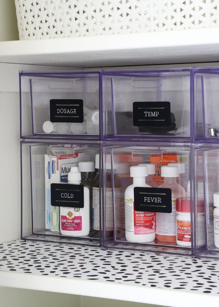 Clear acrylic drawers holding medicines and toiletries