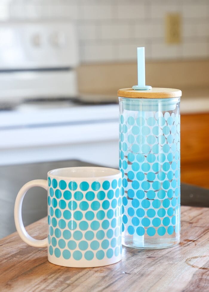 Light blue and bright blue Color Changing Vinyl on a mug and glass bottle