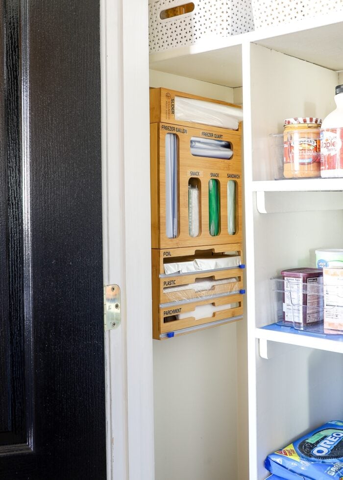 Ziplock bag organizer hanging on the wall inside a pantry