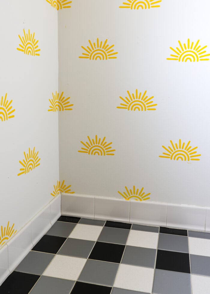 Sunshine wall with black and white checkered floor