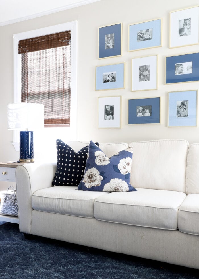 Beige family room with blue, white, and brown accents