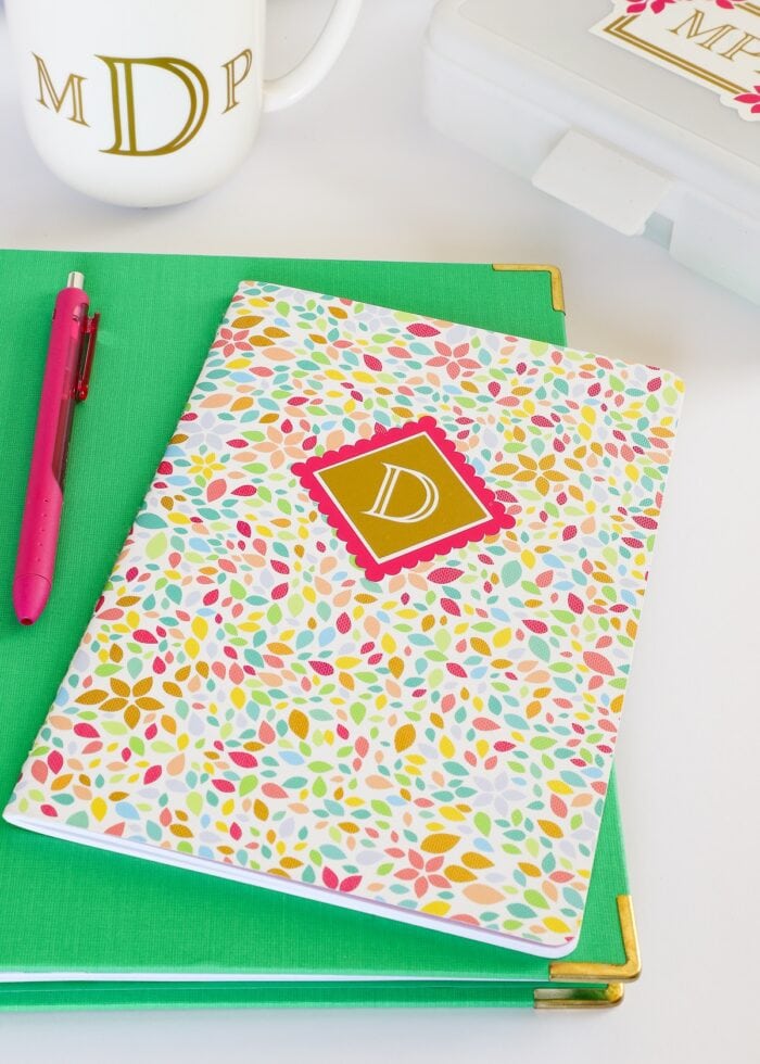 Flowered journal decorated with a hot pink and gold monogram