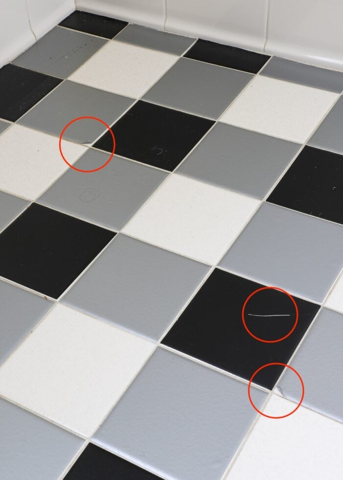 Peeled up corners on bathroom tile stickers