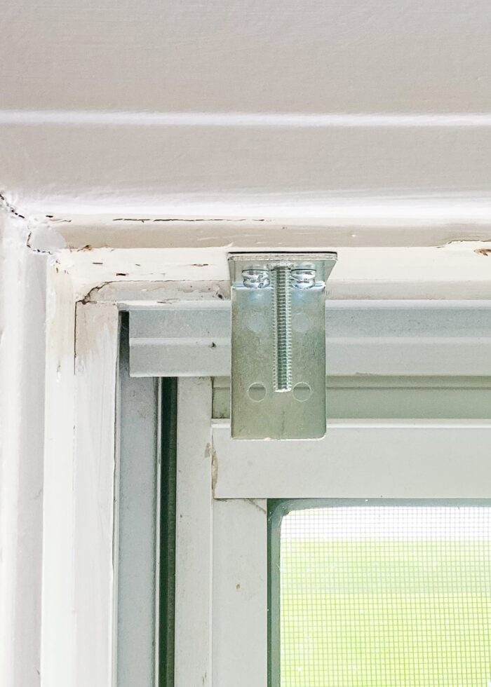 Hardware used to install blinds in top of window frame