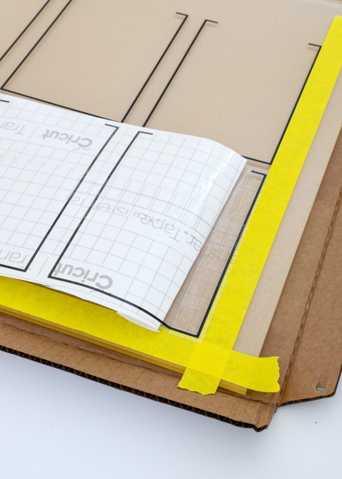 Yellow tape lines on an acrylic calendar board