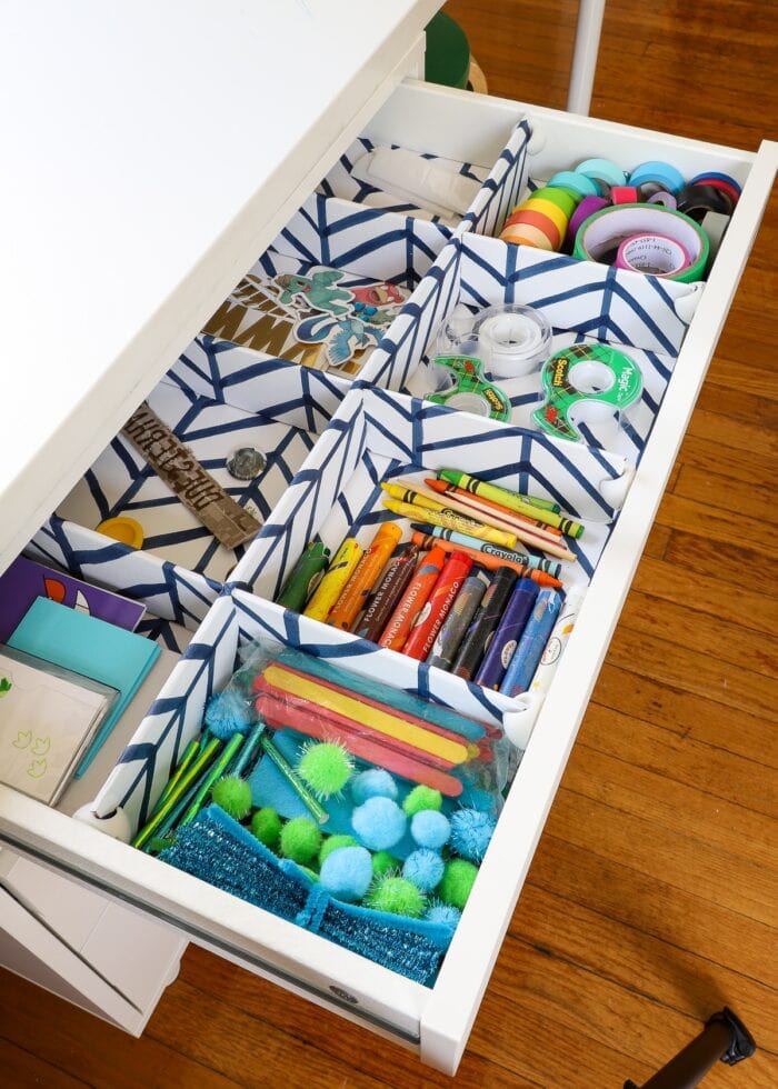 DIY Drawer Dividers inside a shallow drawer to hold art supplies