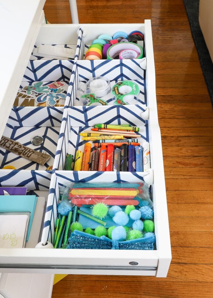 DIY Drawer Dividers inside a shallow drawer to hold art supplies
